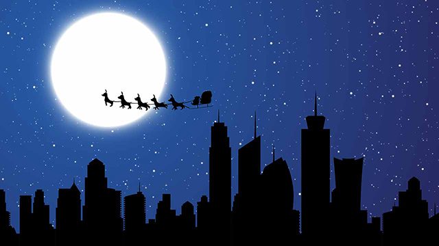 Santa Claus Flying over a city Christmas video